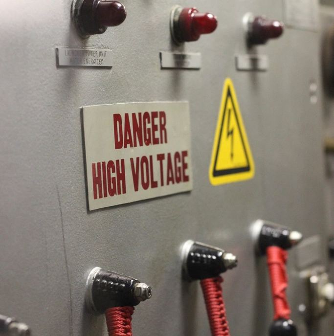 High-voltage control panel with operating handles
